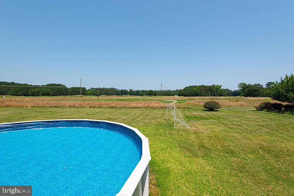 10671 Cathell Road Berlin, MD 21811 - Photo 53 of 63 a view of swimming pool with outdoor space and seating area