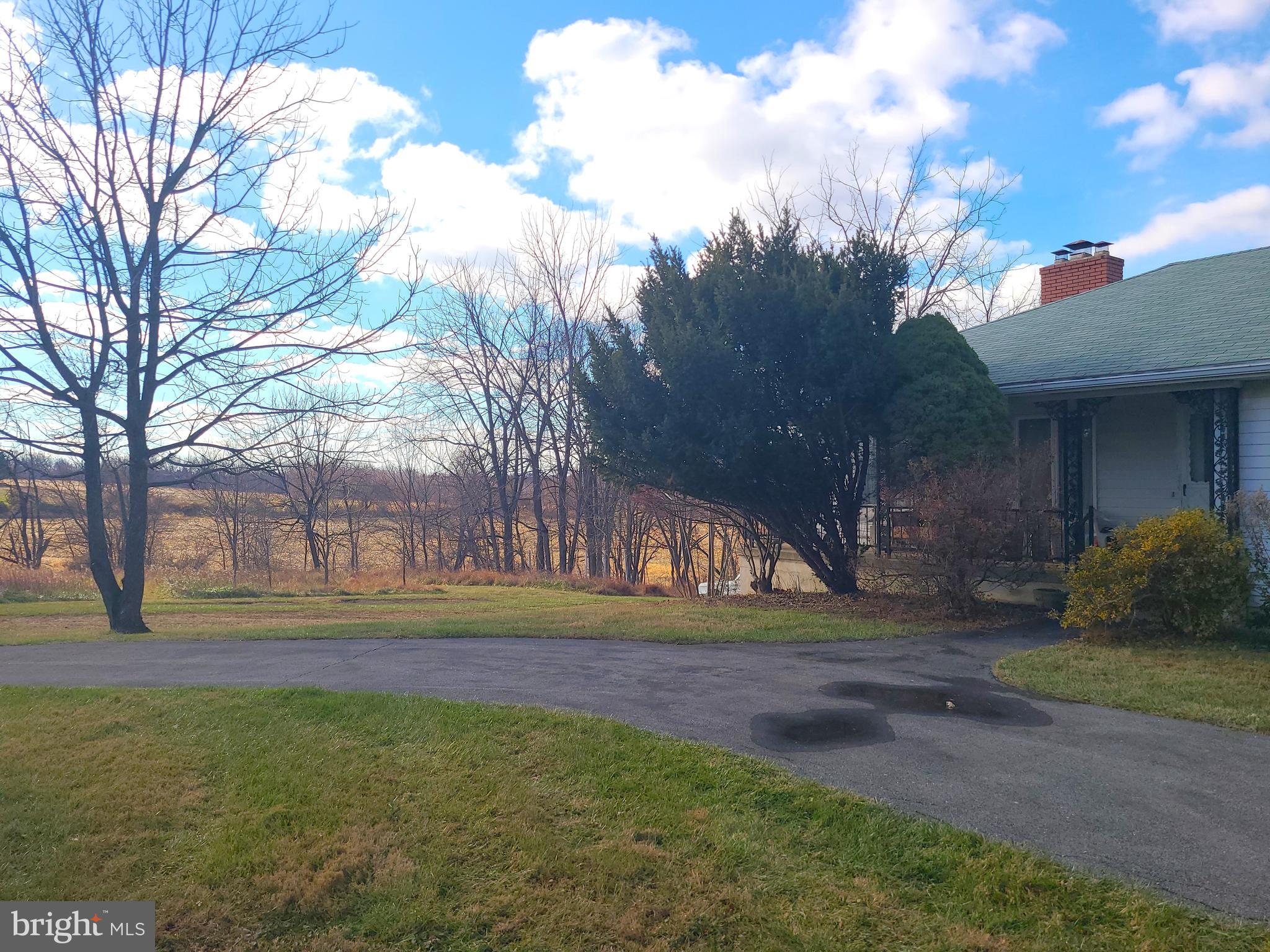 2800 Sykesville Road Westminster, MD 21157 - Photo 4 of 26 a view of outdoor space with garden and trees
