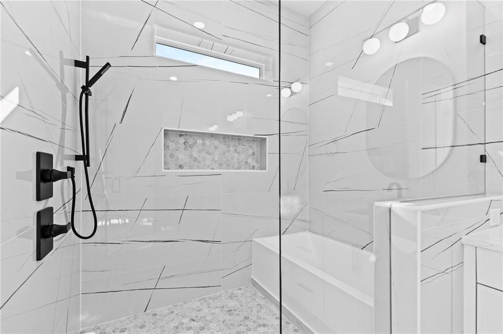6996 Deaton Henry Road Hoschton, GA 30548 - Photo 32 of 65 a bathroom with a shower