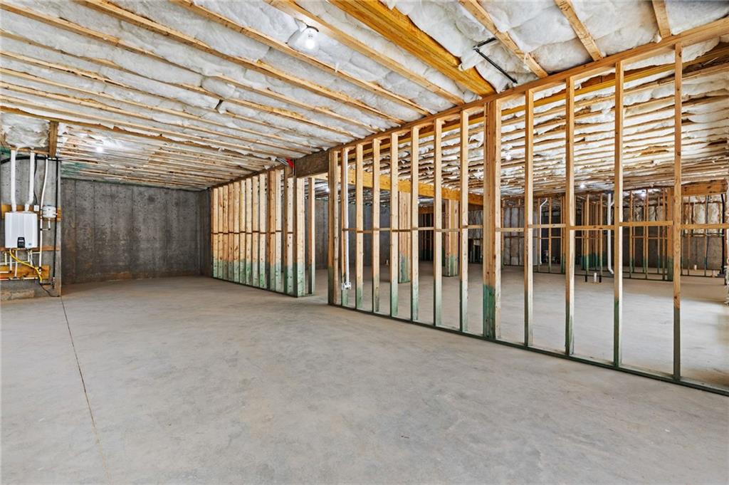 6996 Deaton Henry Road Hoschton, GA 30548 - Photo 45 of 65 a view of a room with wooden walls