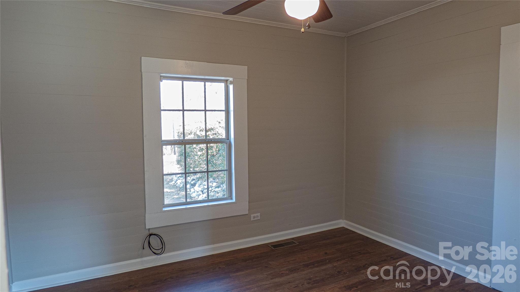 3920 St Peters Church Road Salisbury, NC 28146 - Photo 12 of 32 wooden floor in an empty room with a window
