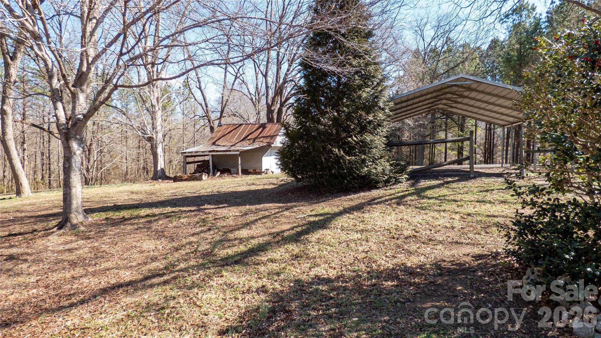 3920 St Peters Church Road Salisbury, NC 28146 - Photo 26 of 32 a front view of house with yard and trees around