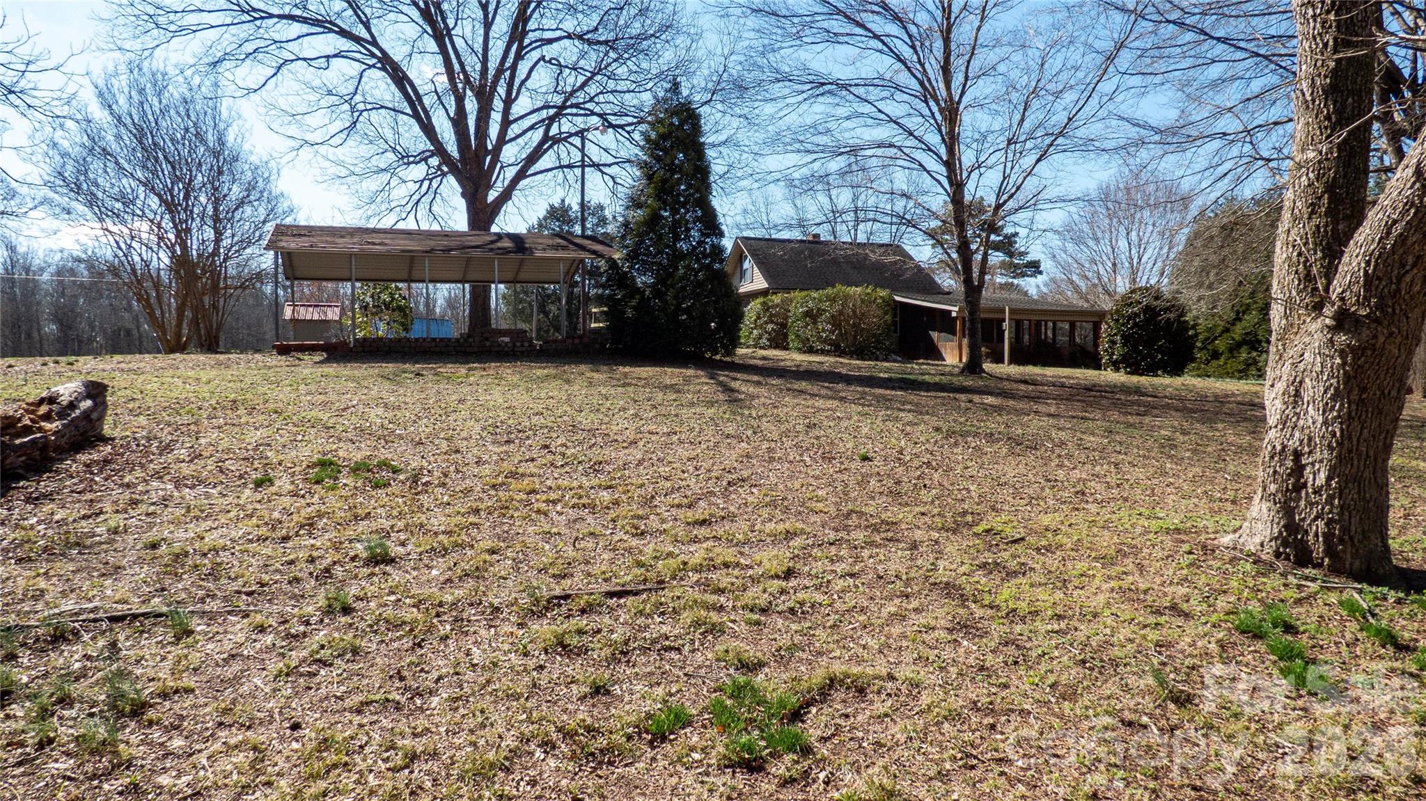 3920 St Peters Church Road Salisbury, NC 28146 - Photo 31 of 32 a front view of a house with a yard covered with snow