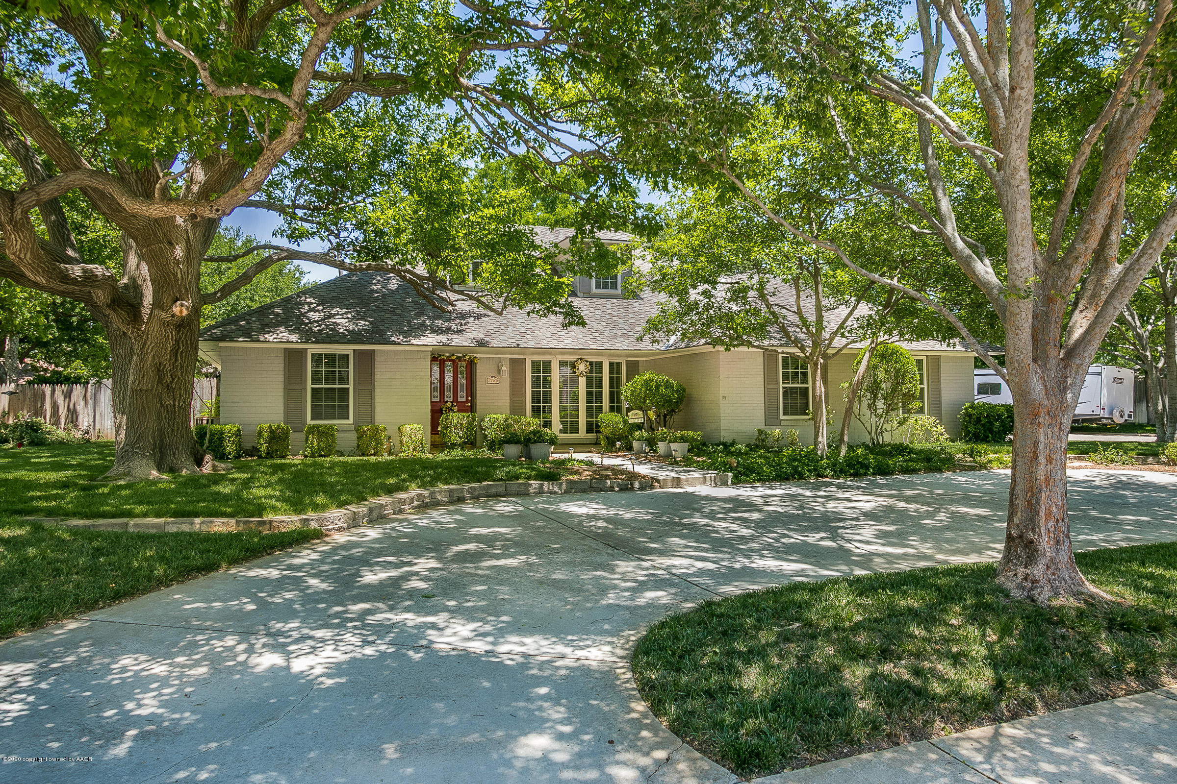 6700 Dreyfuss Road Amarillo, TX 79106 - Photo 2 of 37 a view of a house with a yard