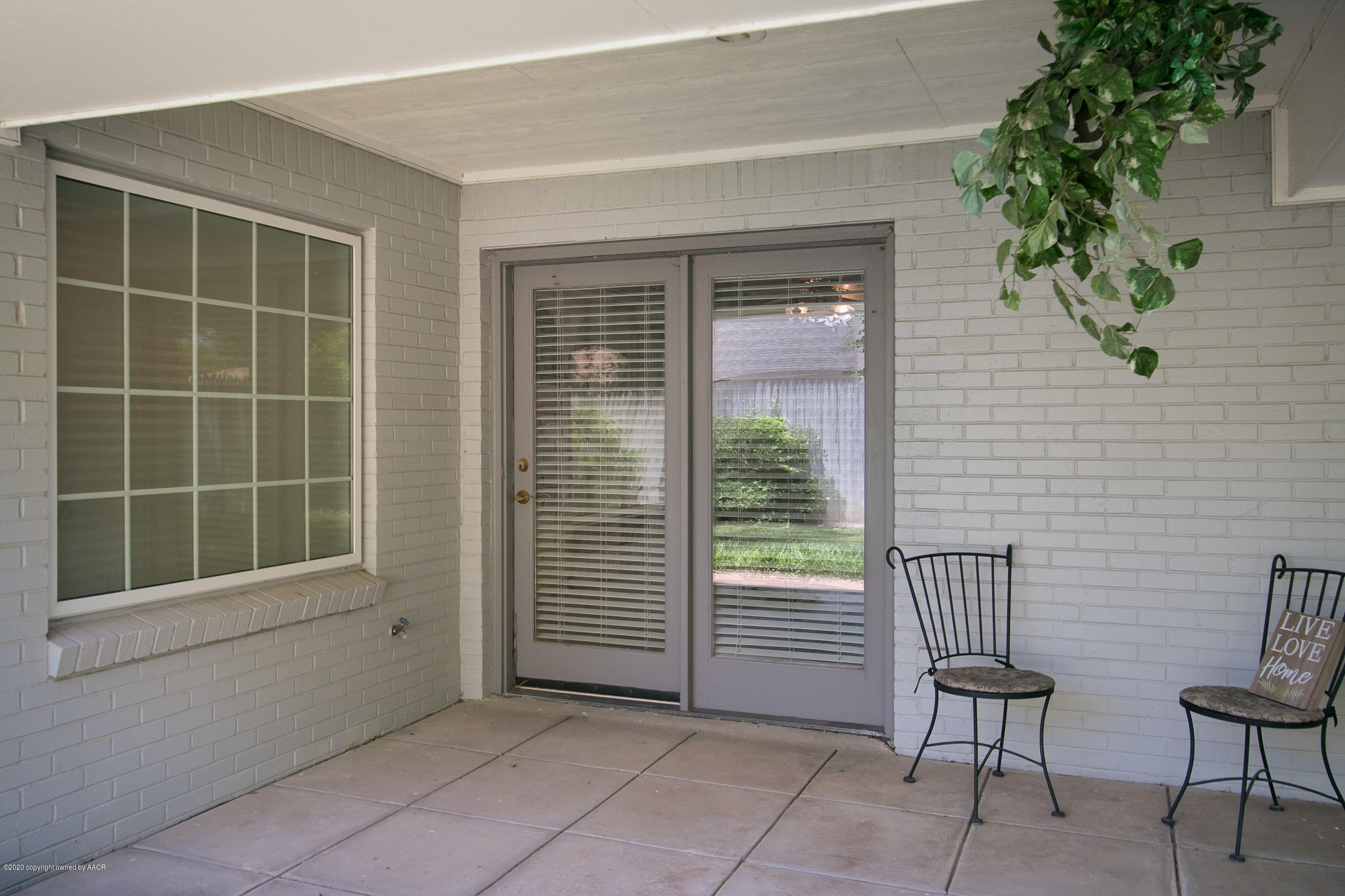 6700 Dreyfuss Road Amarillo, TX 79106 - Photo 24 of 37 a view of chair and door in the room