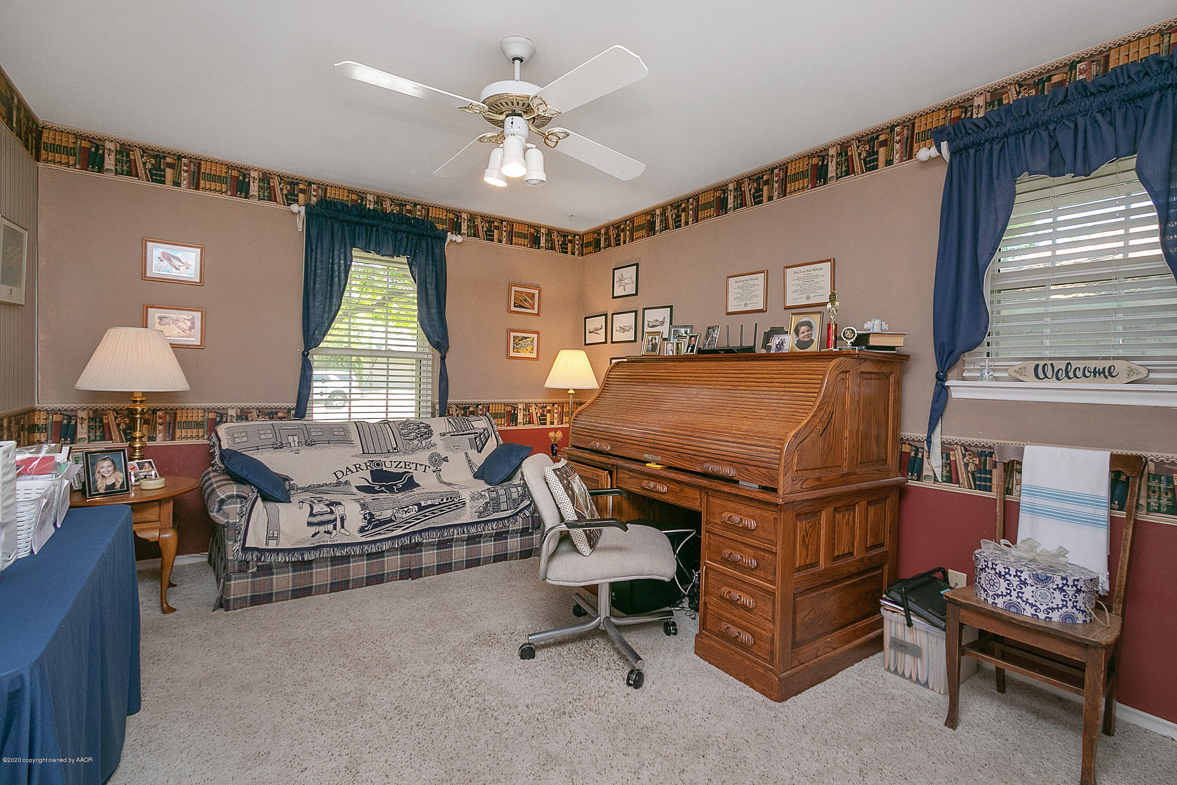 6700 Dreyfuss Road Amarillo, TX 79106 - Photo 26 of 37 a bedroom with furniture and windows