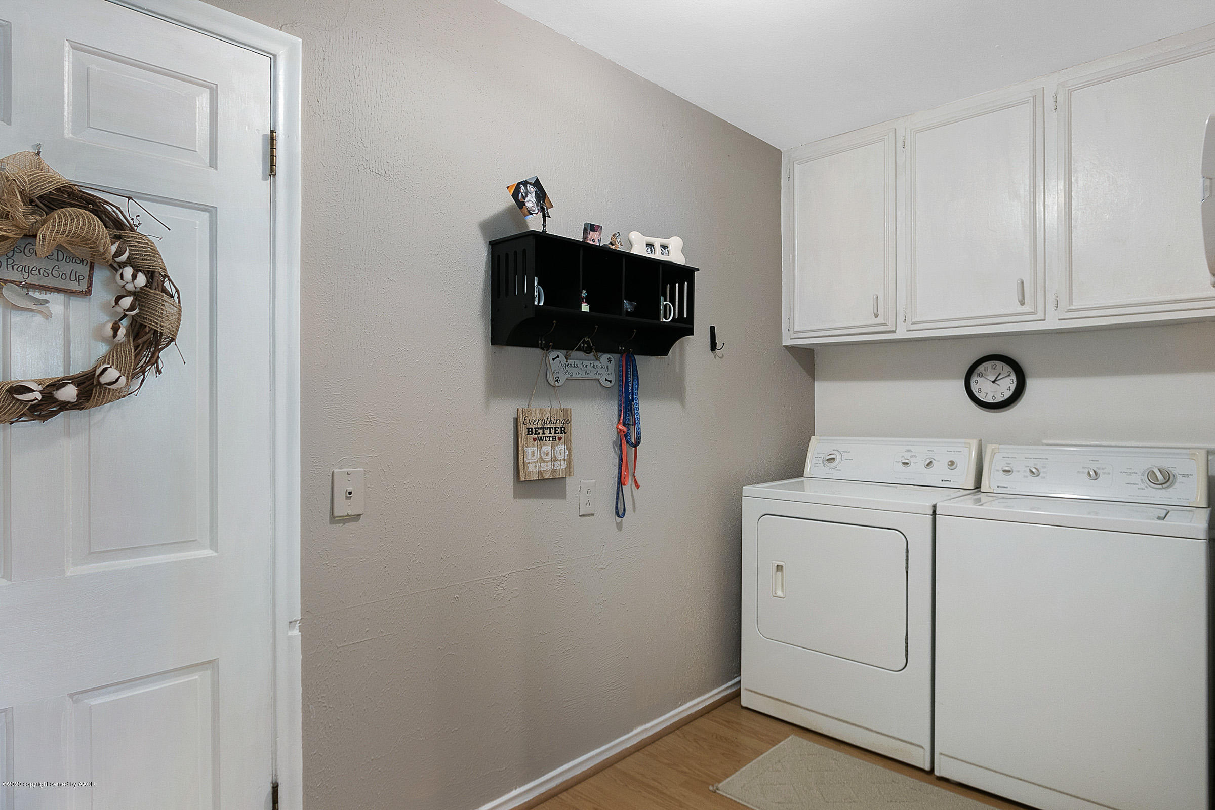 6700 Dreyfuss Road Amarillo, TX 79106 - Photo 32 of 37 a view of storage and utility room with washer and dryer
