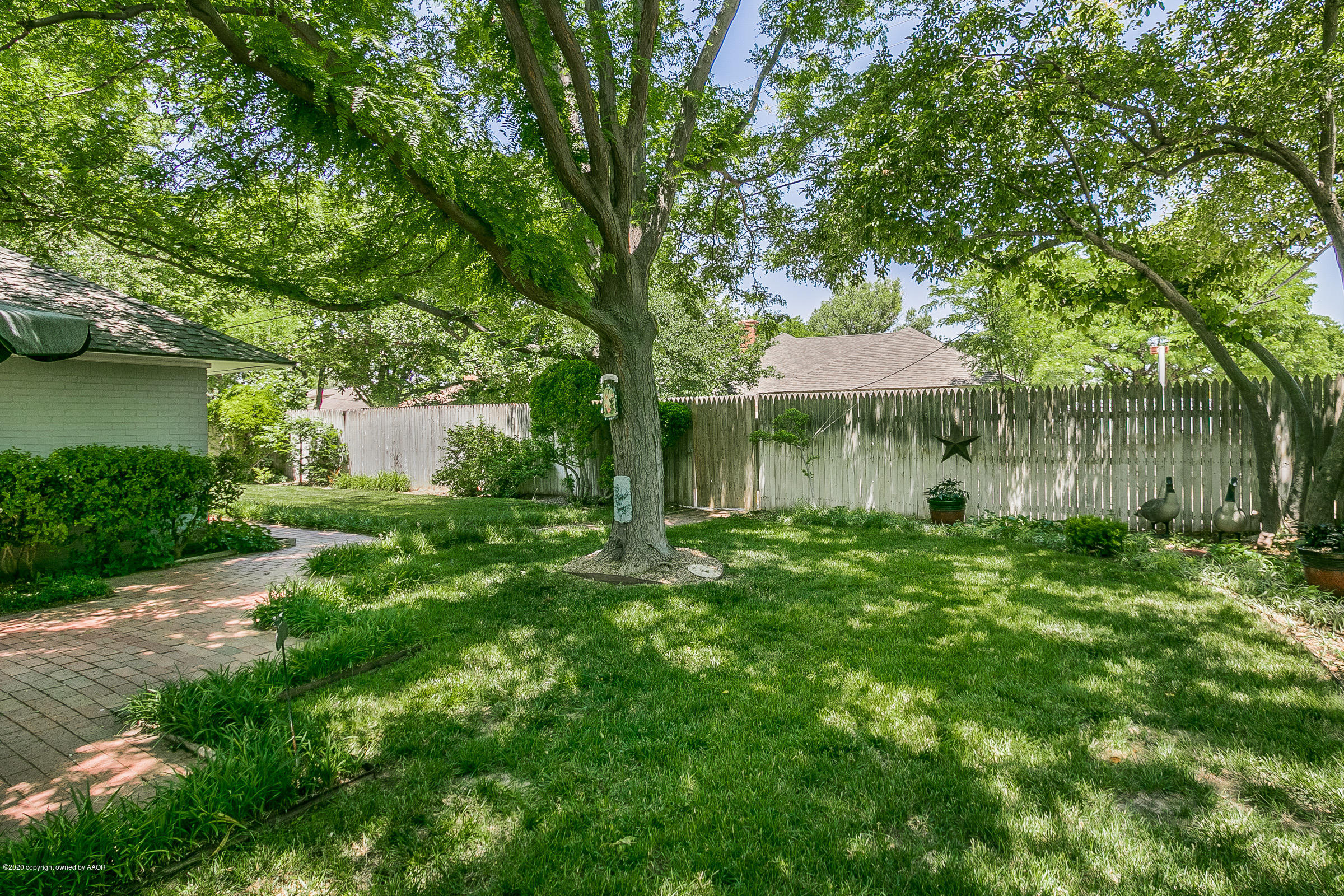 6700 Dreyfuss Road Amarillo, TX 79106 - Photo 35 of 37 a view of a house with a yard