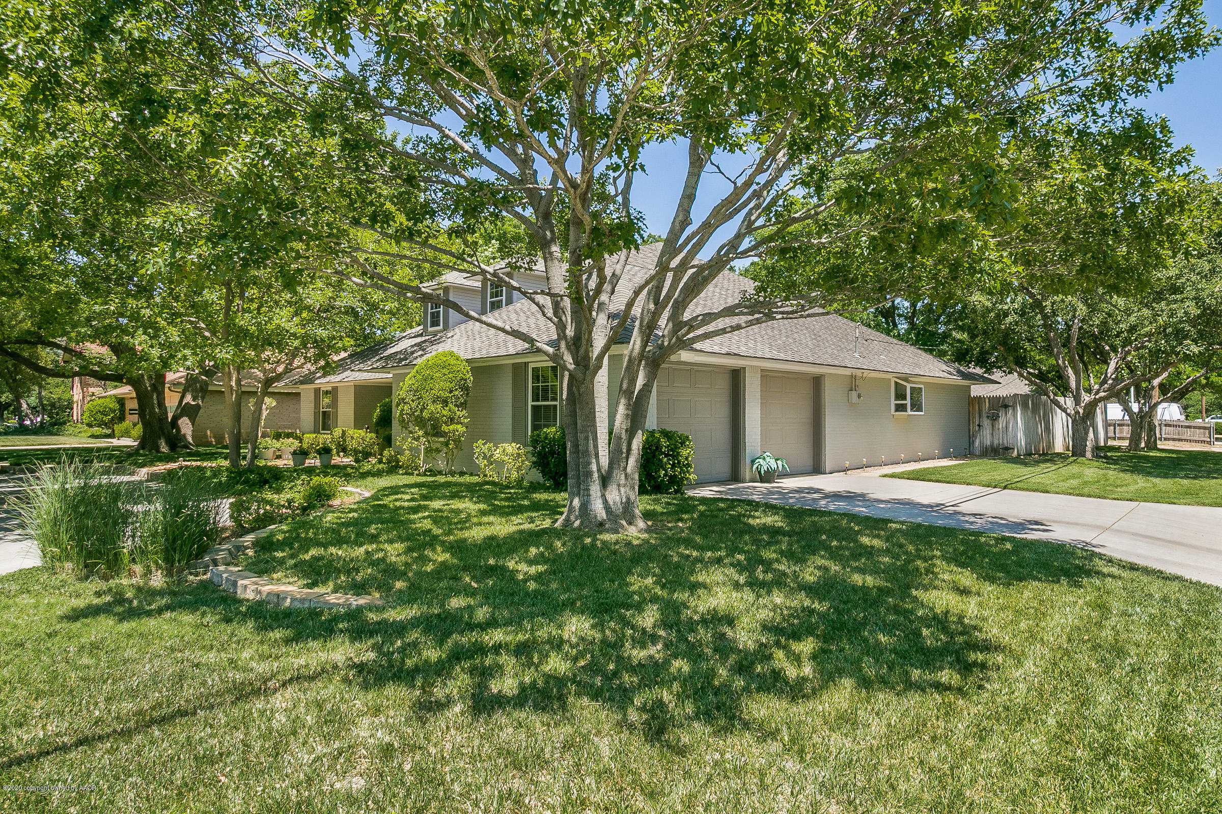 6700 Dreyfuss Road Amarillo, TX 79106 - Photo 37 of 37 a front view of a house with garden