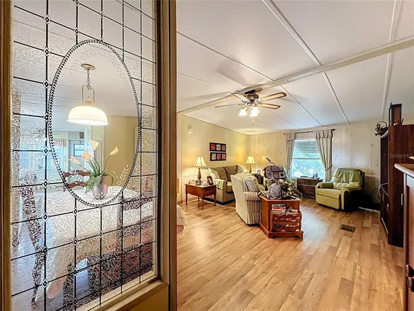 a living room with furniture and a window