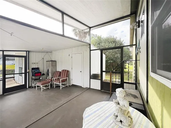 a room with a bed and a window