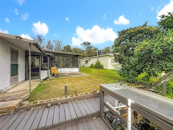 a view of a lake with a deck