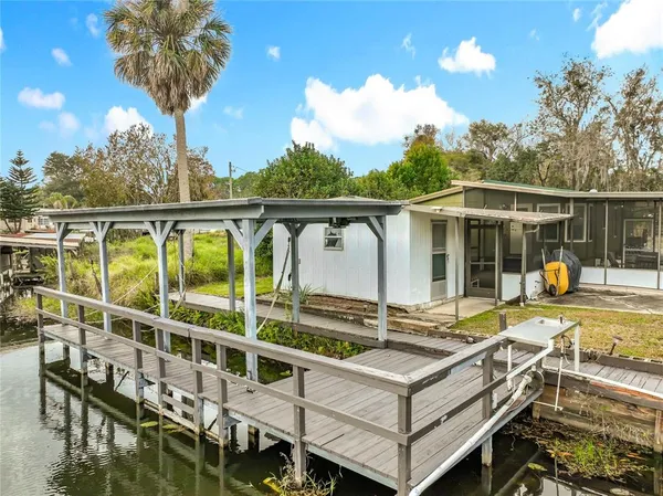a view of a city with lawn chairs