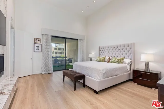 a large kitchen with kitchen island granite countertop a large counter top and sink