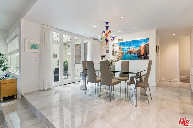 a view of a workspace with furniture