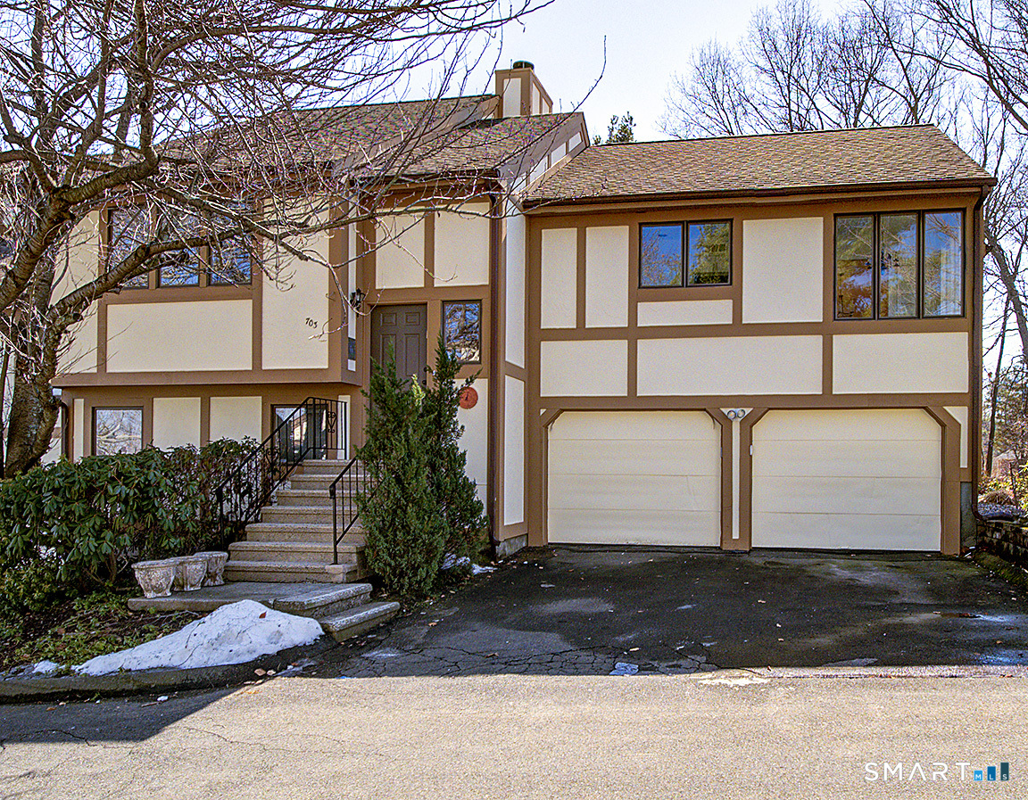 690 Forest Road, Unit 703 West Haven, CT 06516 - Photo 1 of 35 a front view of a house