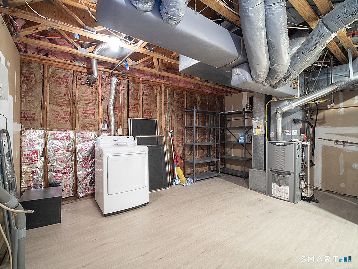 690 Forest Road, Unit 703 West Haven, CT 06516 - Photo 34 of 35 a view of storage and utility room