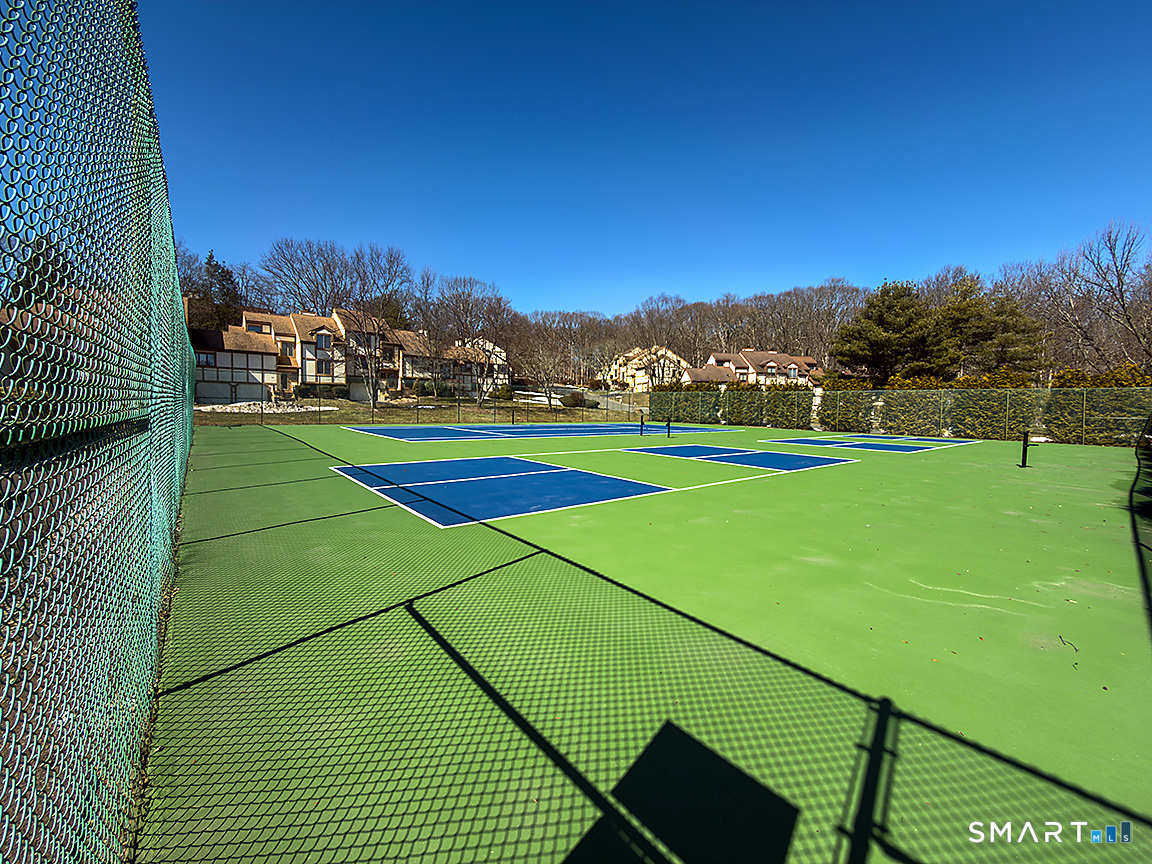 690 Forest Road, Unit 703 West Haven, CT 06516 - Photo 7 of 35 a view of a tennis ground