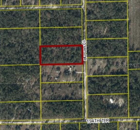 103rd Drive O'Brien, FL 32071 - Photo 4 of 20 a view of a gate