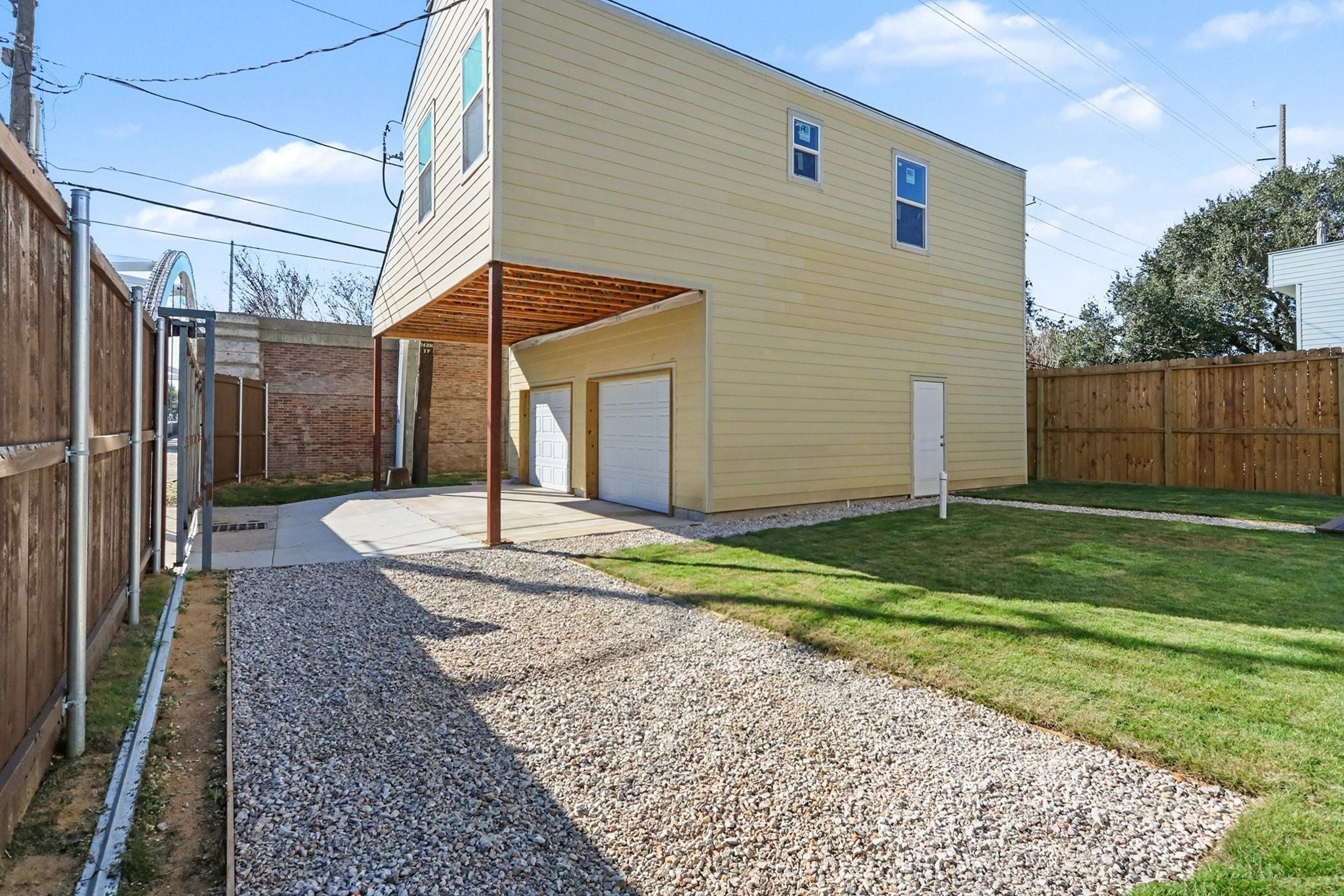 1901 Lexington Street Houston, TX 77098 - Photo 24 of 32 Discover endless possibilities in this newly built spacious garage with double garage door entry and a versatile, unfinished garage apartment that is ready for your personal touches.