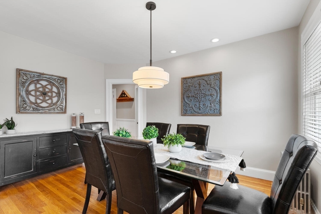 35 Richardson Street, Unit 2 Wakefield, MA 01880 - Photo 12 of 32 a view of a dining room with furniture window and wooden floor