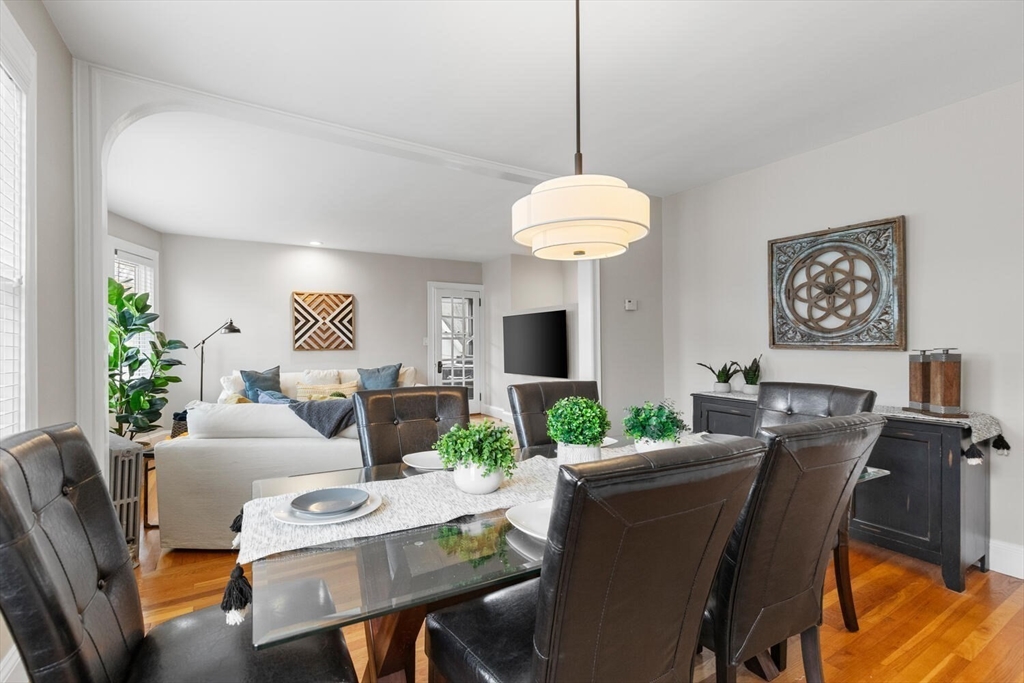 35 Richardson Street, Unit 2 Wakefield, MA 01880 - Photo 13 of 32 a view of a dining room with furniture window and wooden floor