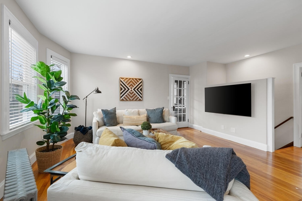 35 Richardson Street, Unit 2 Wakefield, MA 01880 - Photo 16 of 32 a living room with furniture and a flat screen tv
