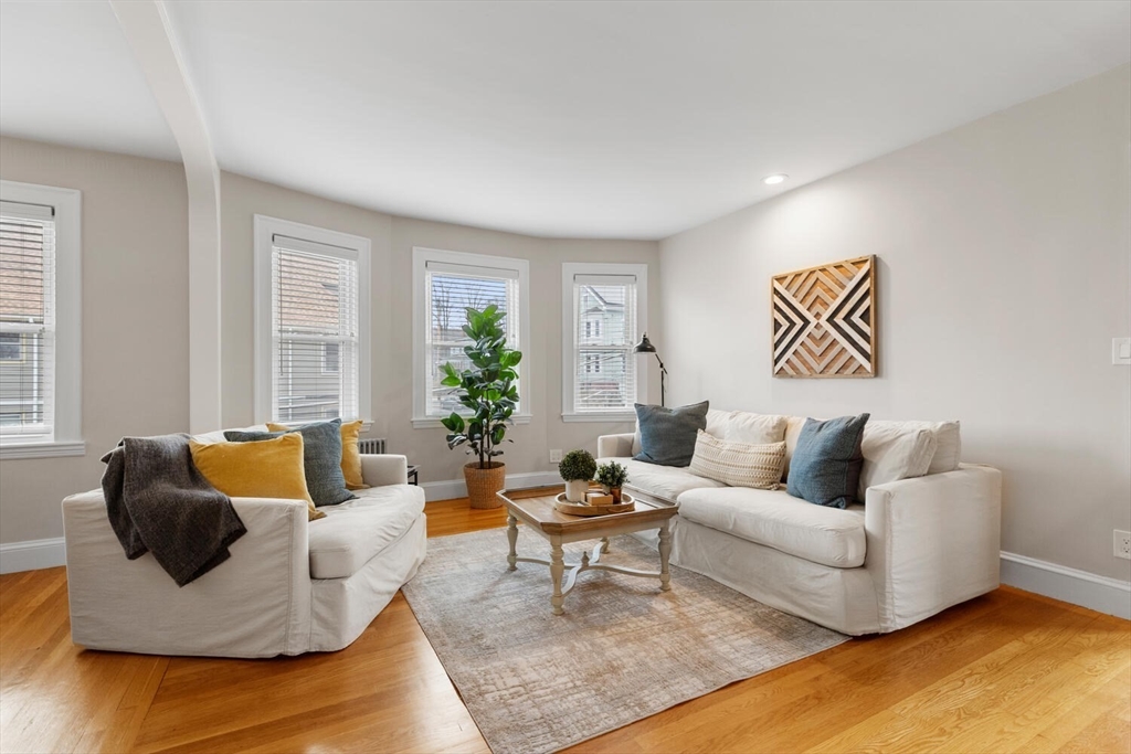 35 Richardson Street, Unit 2 Wakefield, MA 01880 - Photo 17 of 32 a living room with furniture and a potted plant