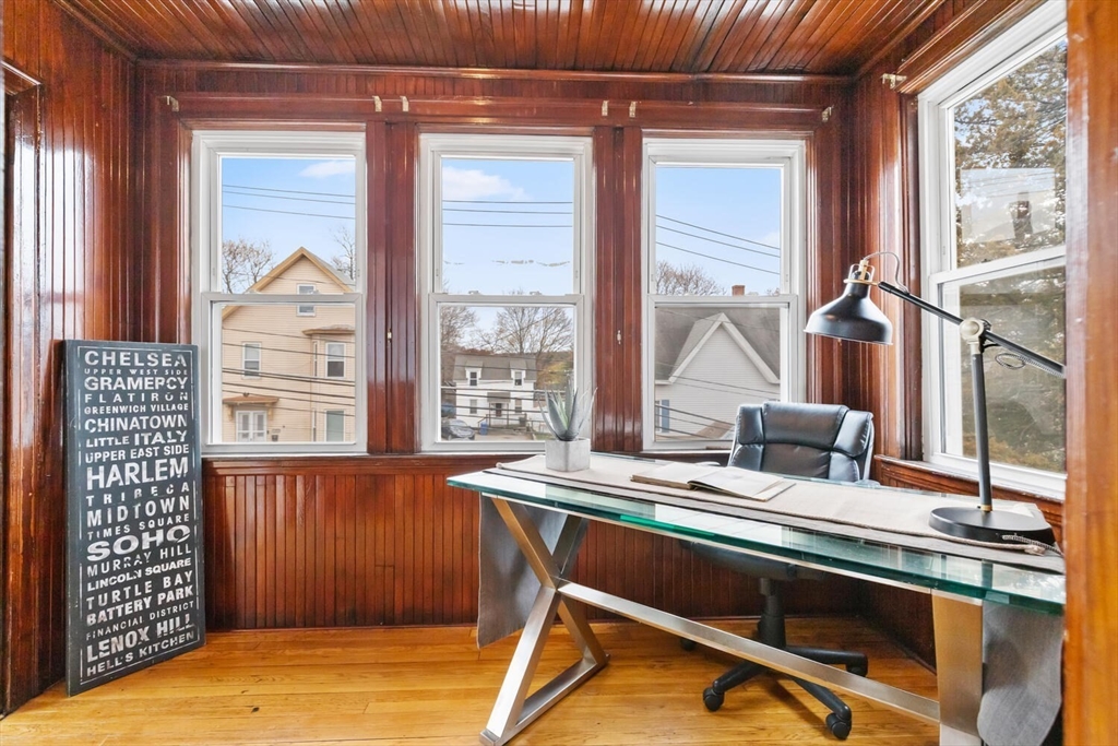 35 Richardson Street, Unit 2 Wakefield, MA 01880 - Photo 19 of 32 a living room filled with furniture