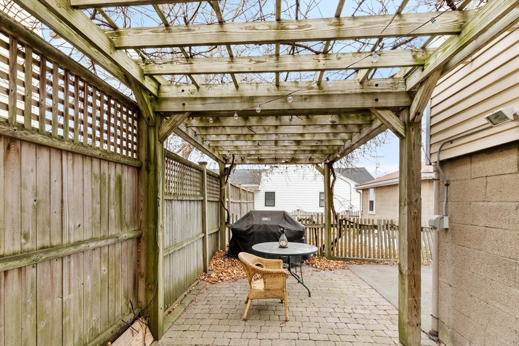 35 Richardson Street, Unit 2 Wakefield, MA 01880 - Photo 30 of 32 a building outdoor space with patio furniture and potted plants