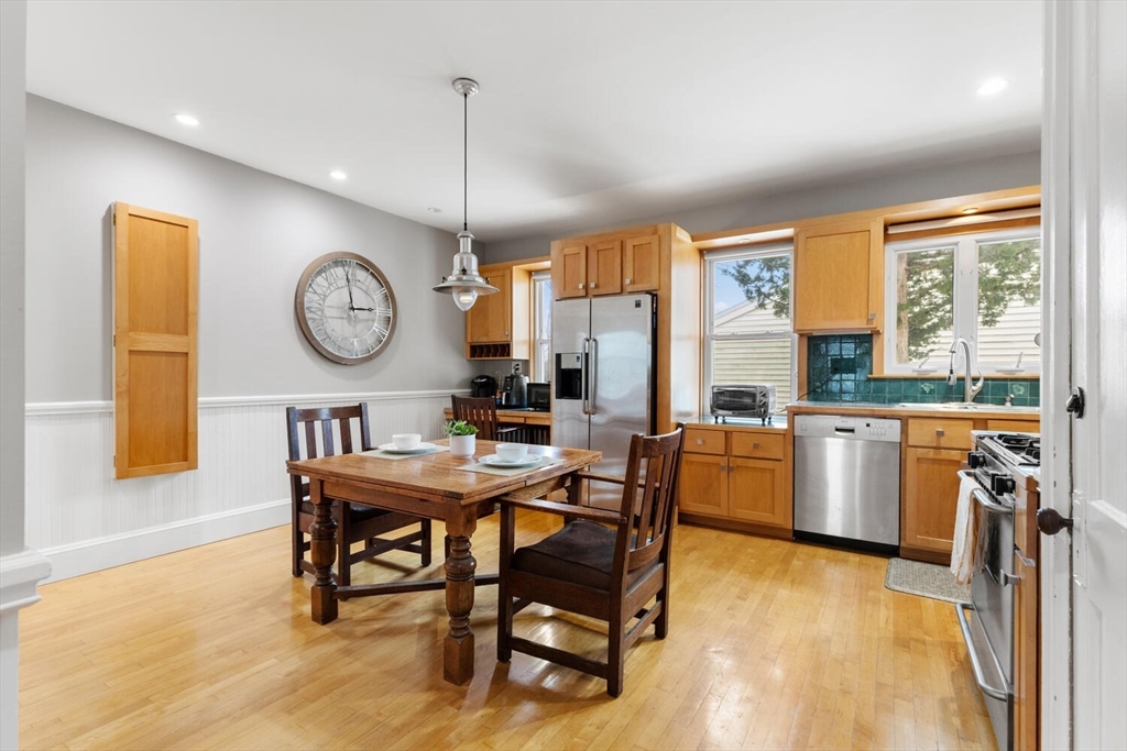 35 Richardson Street, Unit 2 Wakefield, MA 01880 - Photo 7 of 32 a view of a dining room with furniture window and wooden floor