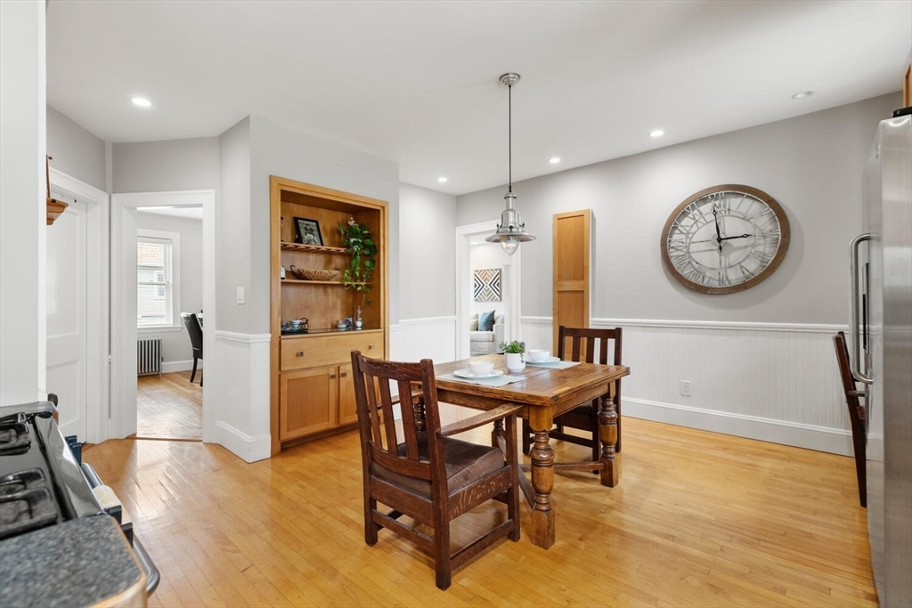 35 Richardson Street, Unit 2 Wakefield, MA 01880 - Photo 10 of 32 a view of a dining room with furniture window and wooden floor