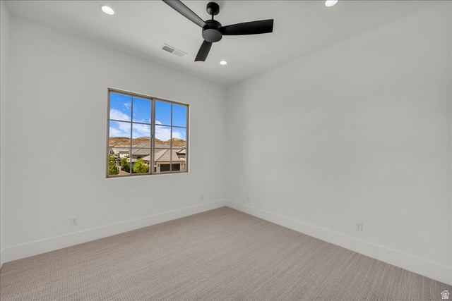 1620 Belayer Drive St. George, UT 84770 - Photo 35 of 51 Room with neutral wall tones and patterned carpeting