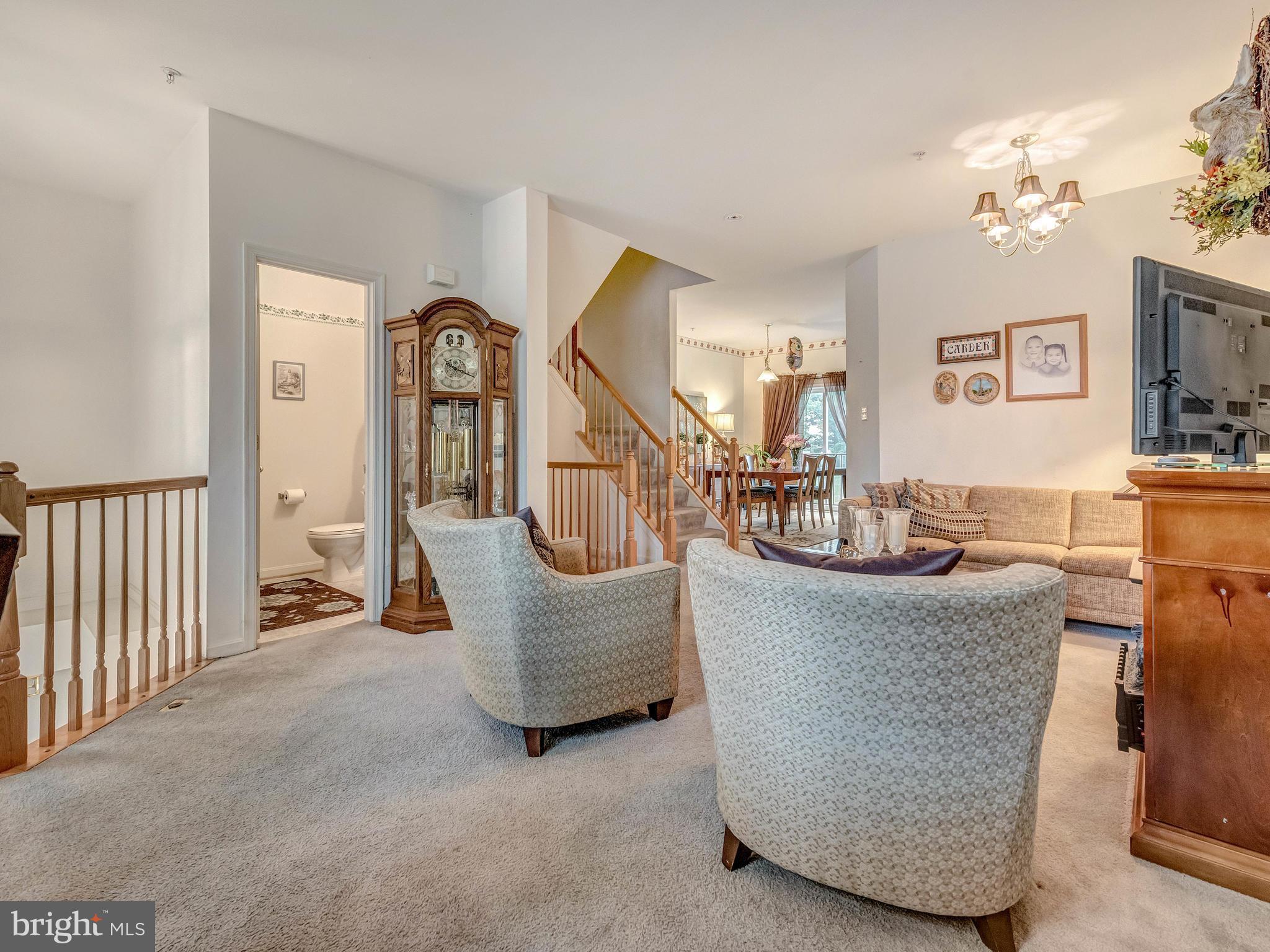 612 Wild Hunt Road Frederick, MD 21703 - Photo 12 of 24 Living Room - Open to Foyer Down below