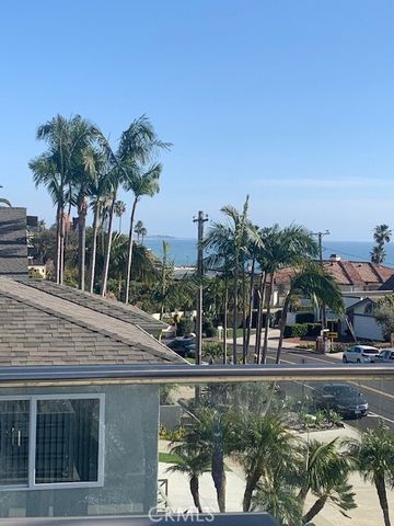 a view of outdoor space with palm tree