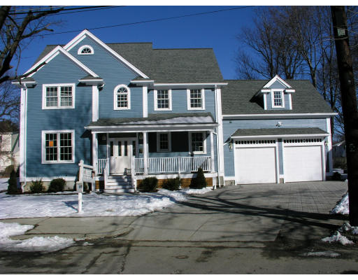 48 Edward Road Newton, MA 02465 - Photo 3 of 27 a front view of a house with a yard