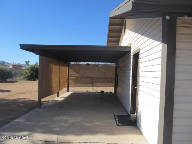 1160 Avenida Leon Rio Rico, AZ 85648 - Photo 10 of 47 a backyard of a house with a yard