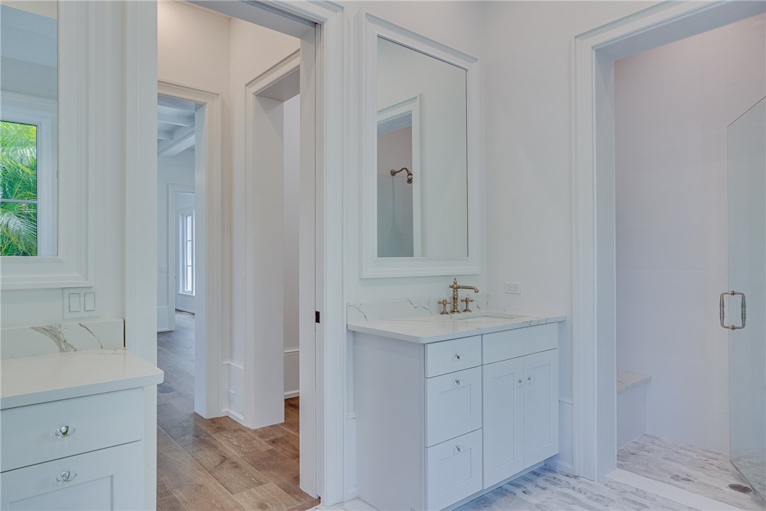 1375 Sandy Lane Vero Beach, FL 32963 - Photo 13 of 36 a bathroom with a sink toilet and tub