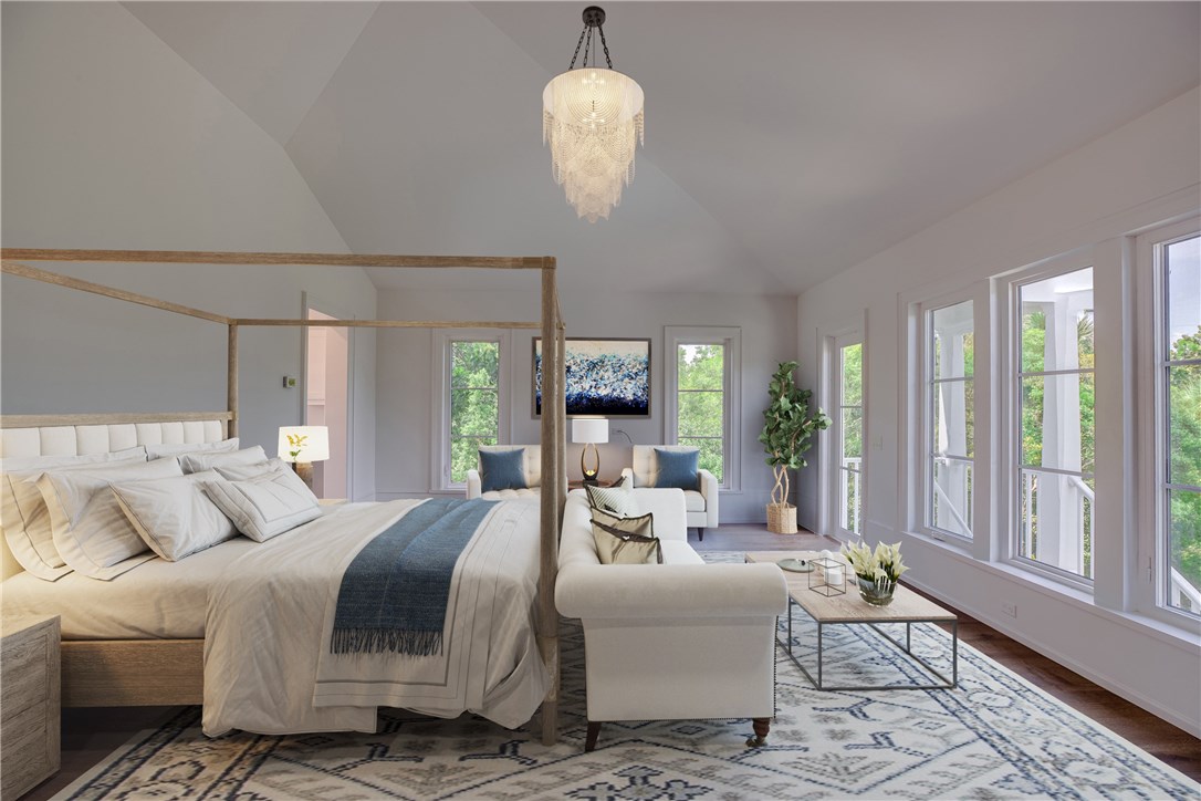 1375 Sandy Lane Vero Beach, FL 32963 - Photo 17 of 36 a bedroom with a bed and large windows