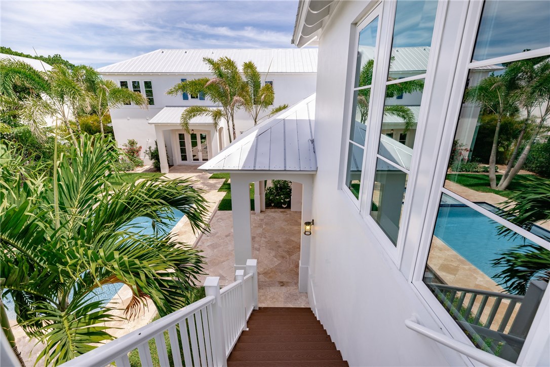 1375 Sandy Lane Vero Beach, FL 32963 - Photo 21 of 36 a aerial view of a house with balcony and garden