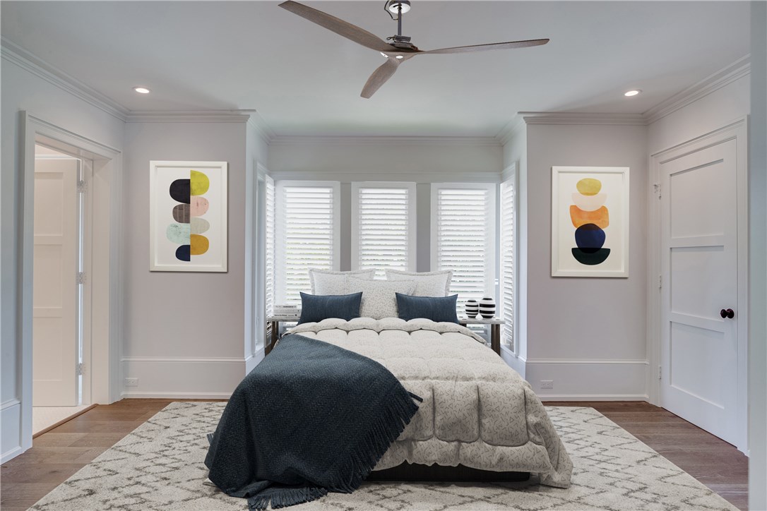 1375 Sandy Lane Vero Beach, FL 32963 - Photo 25 of 36 a bedroom with a bed and wooden floor