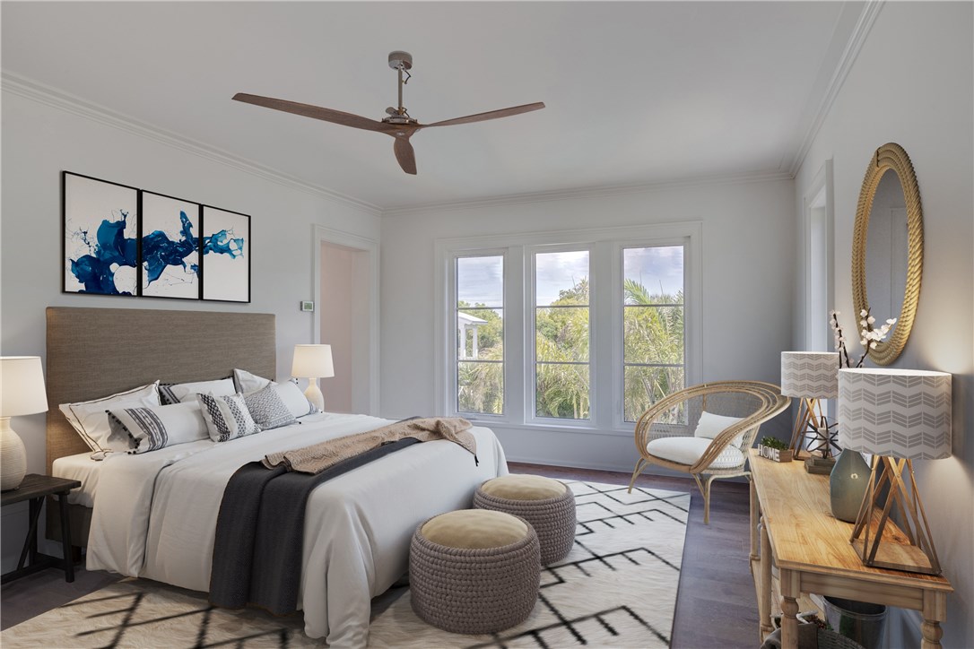 1375 Sandy Lane Vero Beach, FL 32963 - Photo 27 of 36 a bedroom with a bed and a couch