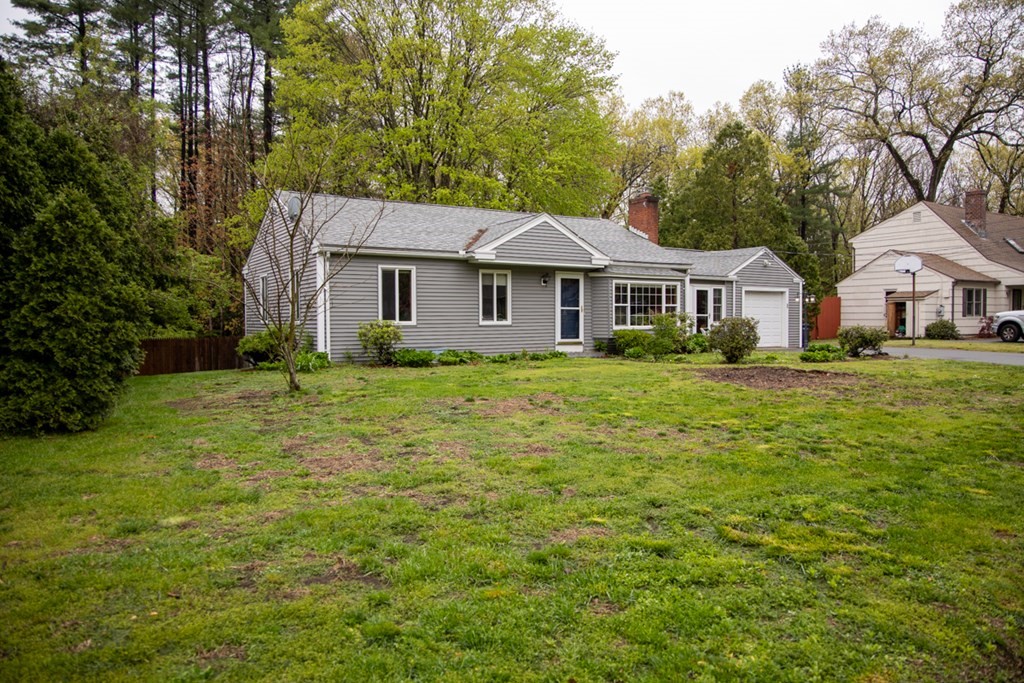 36 Whitmun Road Longmeadow, MA 01106 - Photo 3 of 27 a view of a house with a big yard and large trees