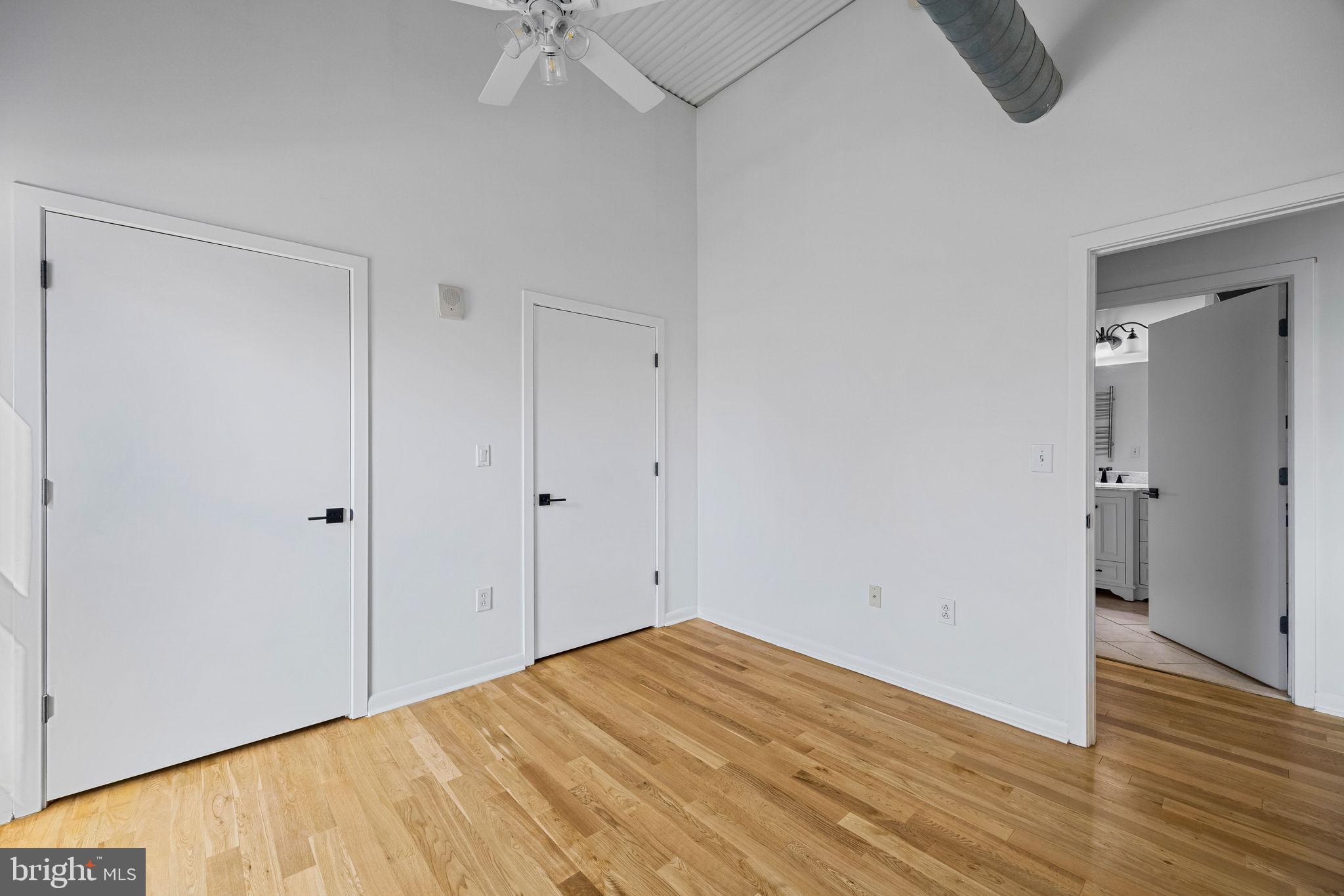 2200-28 Arch Street, Unit 612 Philadelphia, PA 19103 - Photo 26 of 43 a view of empty room with wooden floor