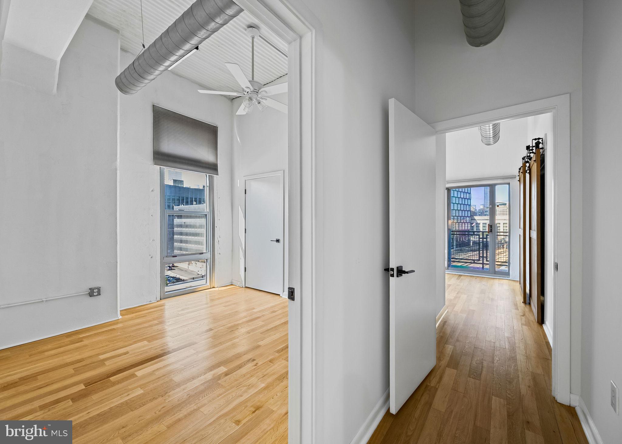 2200-28 Arch Street, Unit 612 Philadelphia, PA 19103 - Photo 29 of 43 wooden floor in an empty room