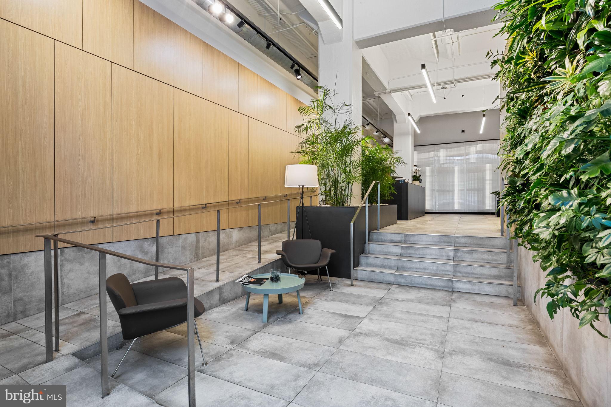 2200-28 Arch Street, Unit 612 Philadelphia, PA 19103 - Photo 43 of 43 a building outdoor space with patio furniture and potted plants