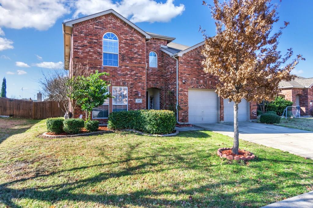 139 Redbud Drive Forney, TX 75126 - Photo 1 of 1 a house view with a garden space