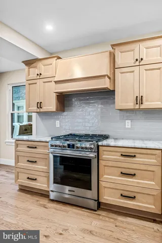 a view of a hallway with stairs
