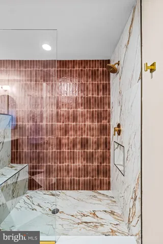 a bathroom with a double vanity sink and mirror