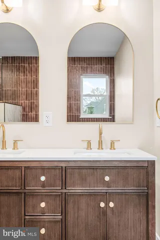 a bathroom with a toilet a sink and bathtub